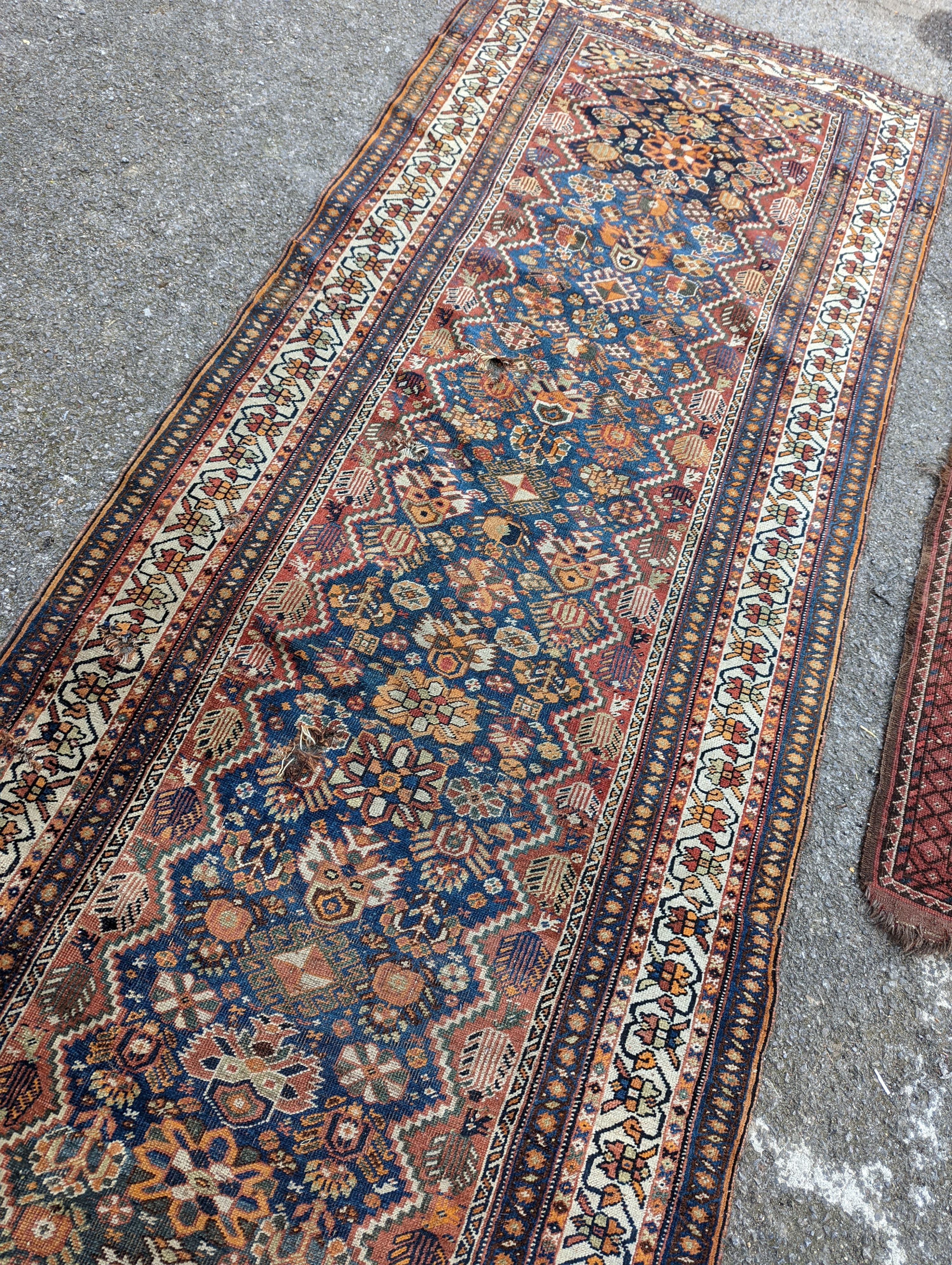 A North West Persian blue ground runner, 300 x 109 (worn and holed) a North West Persian rug, Bohara rug and mat